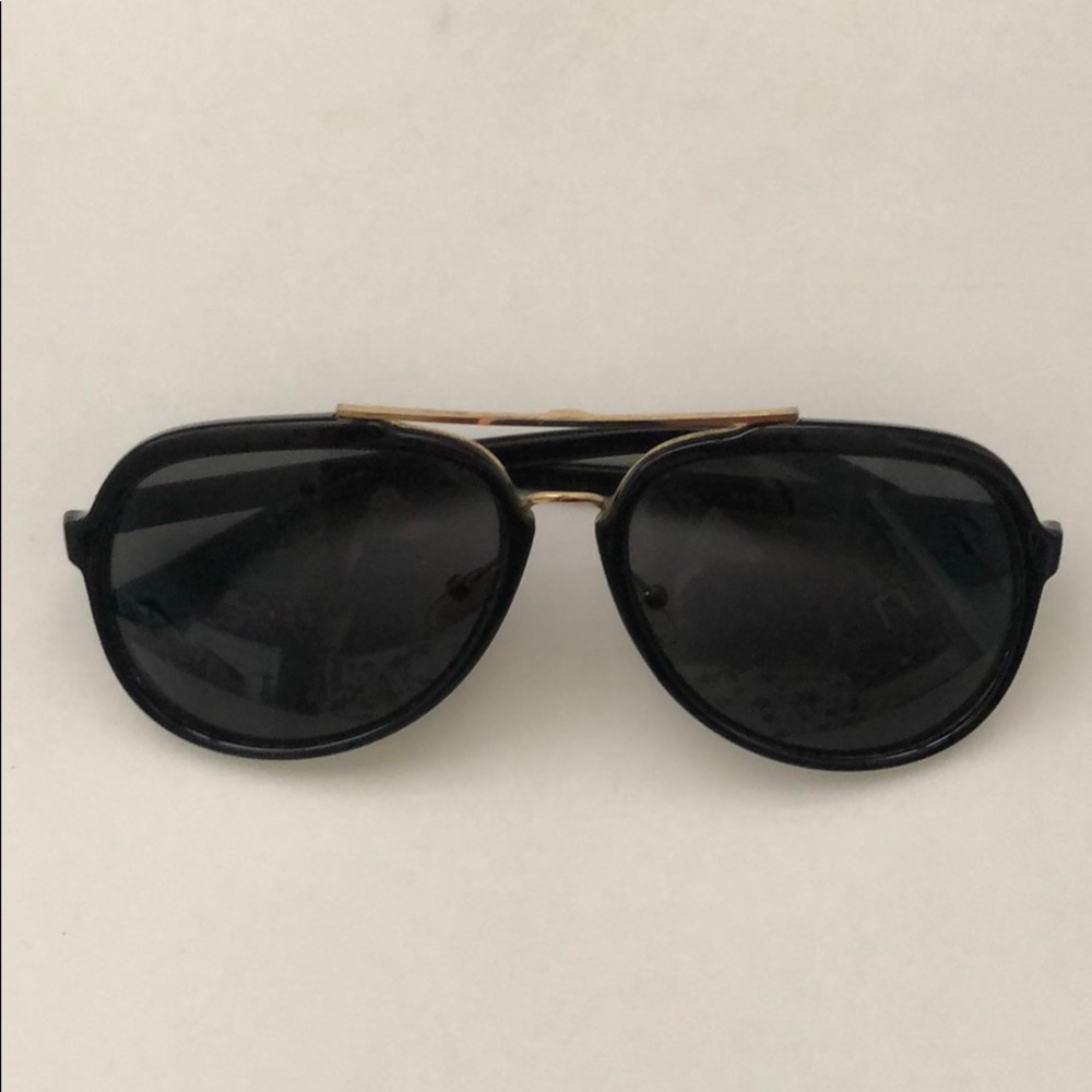 Black and gold aviators
